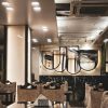 Elegant cafe interior with modern decor and cozy ambiance in Dhaka, Bangladesh.